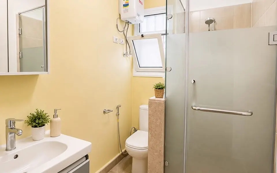 Bathroom with walk-in glass shower