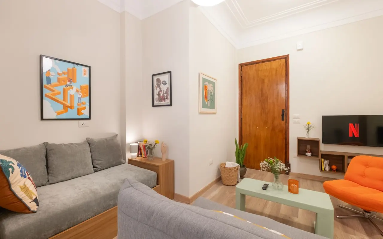 Lounge with a smart TV and gallery wall