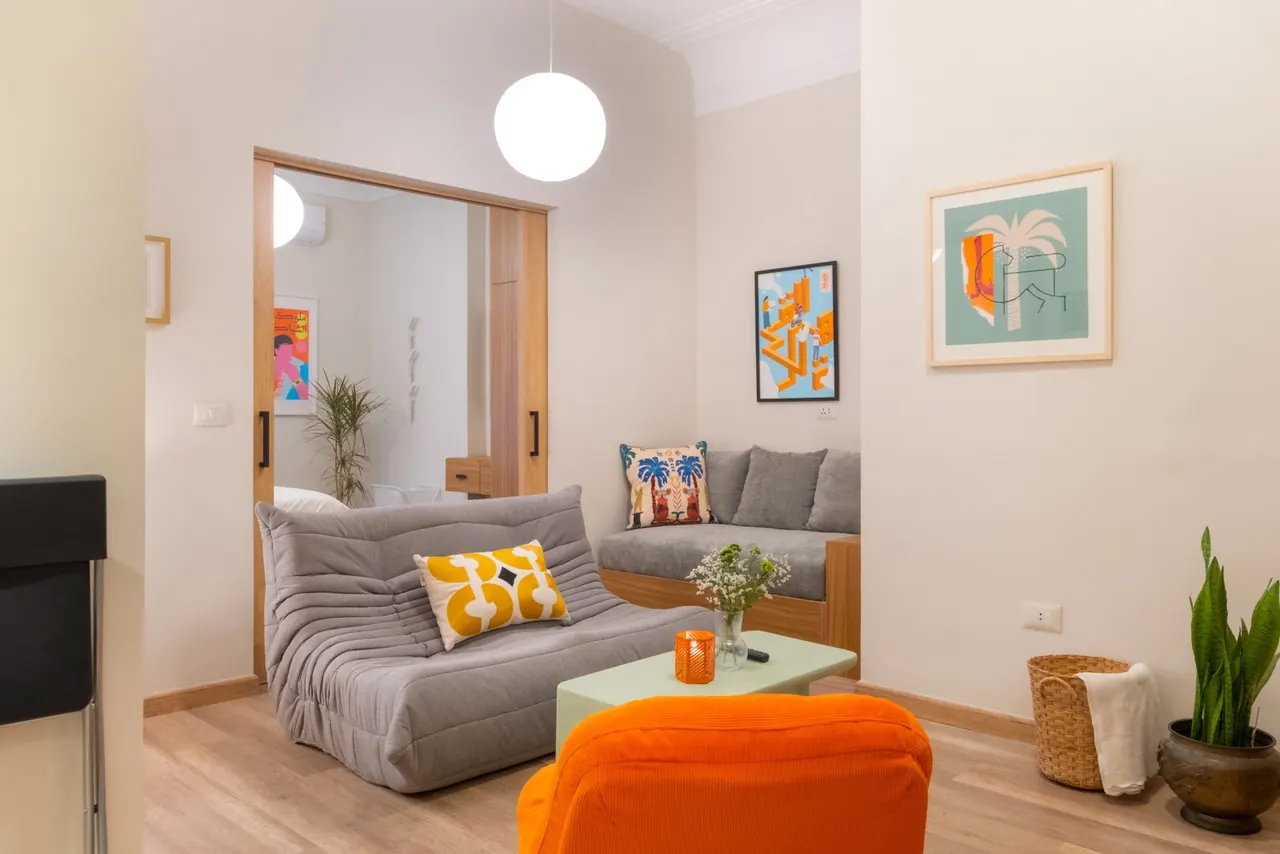 Toucan living room with a designer sofa and warm Cairo light
